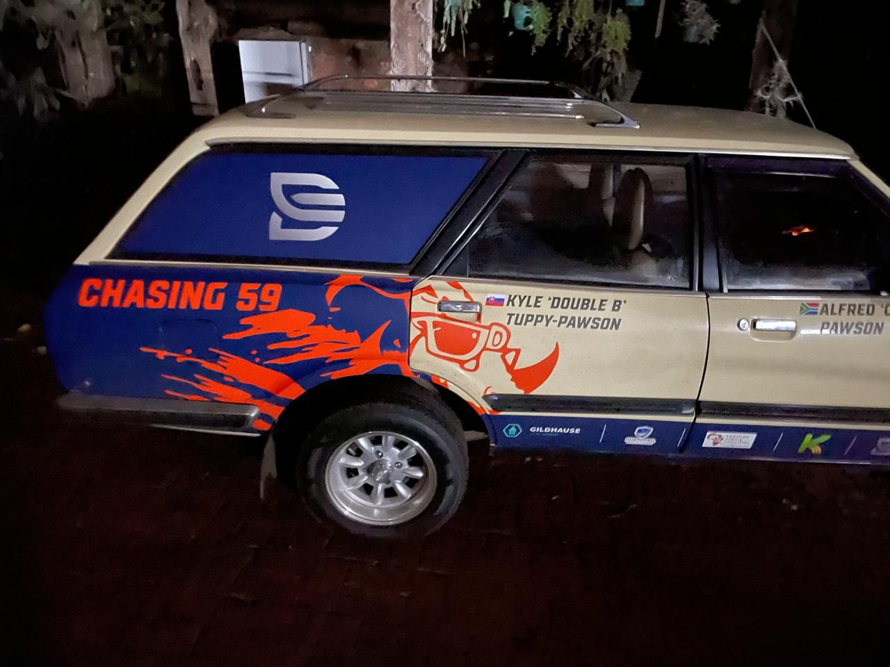 A Bull Run 2026 car in navy and orange CHASING 59 livery
